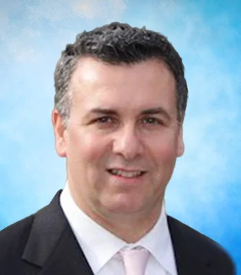 Portrait of John Ahlborn, NYS Licensed Real Estate Salesperson.