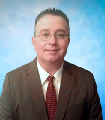 Portrait of Michael Sarich, NYS Licensed Real Estate Salesperson.