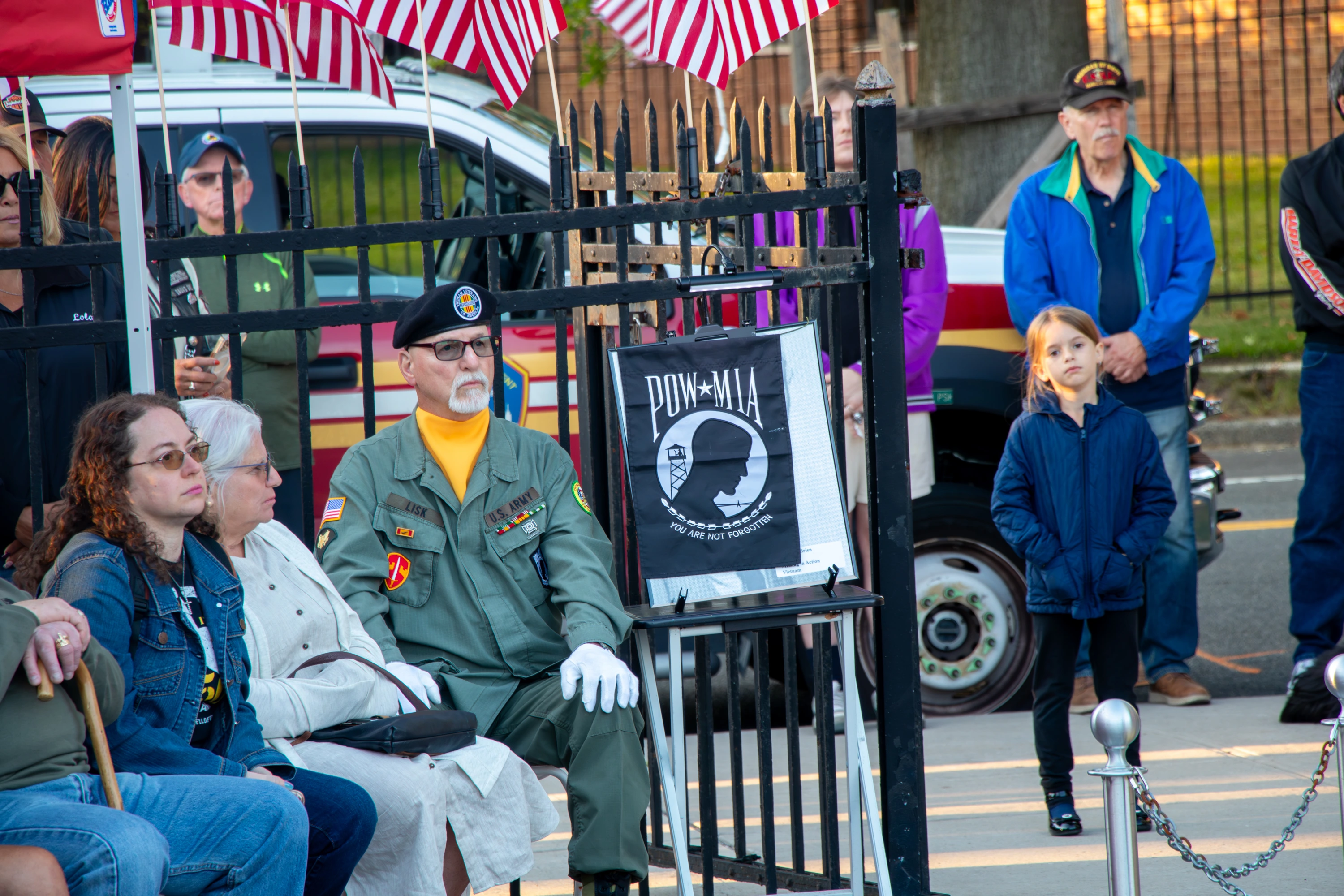 Veterans saluting during ceremony