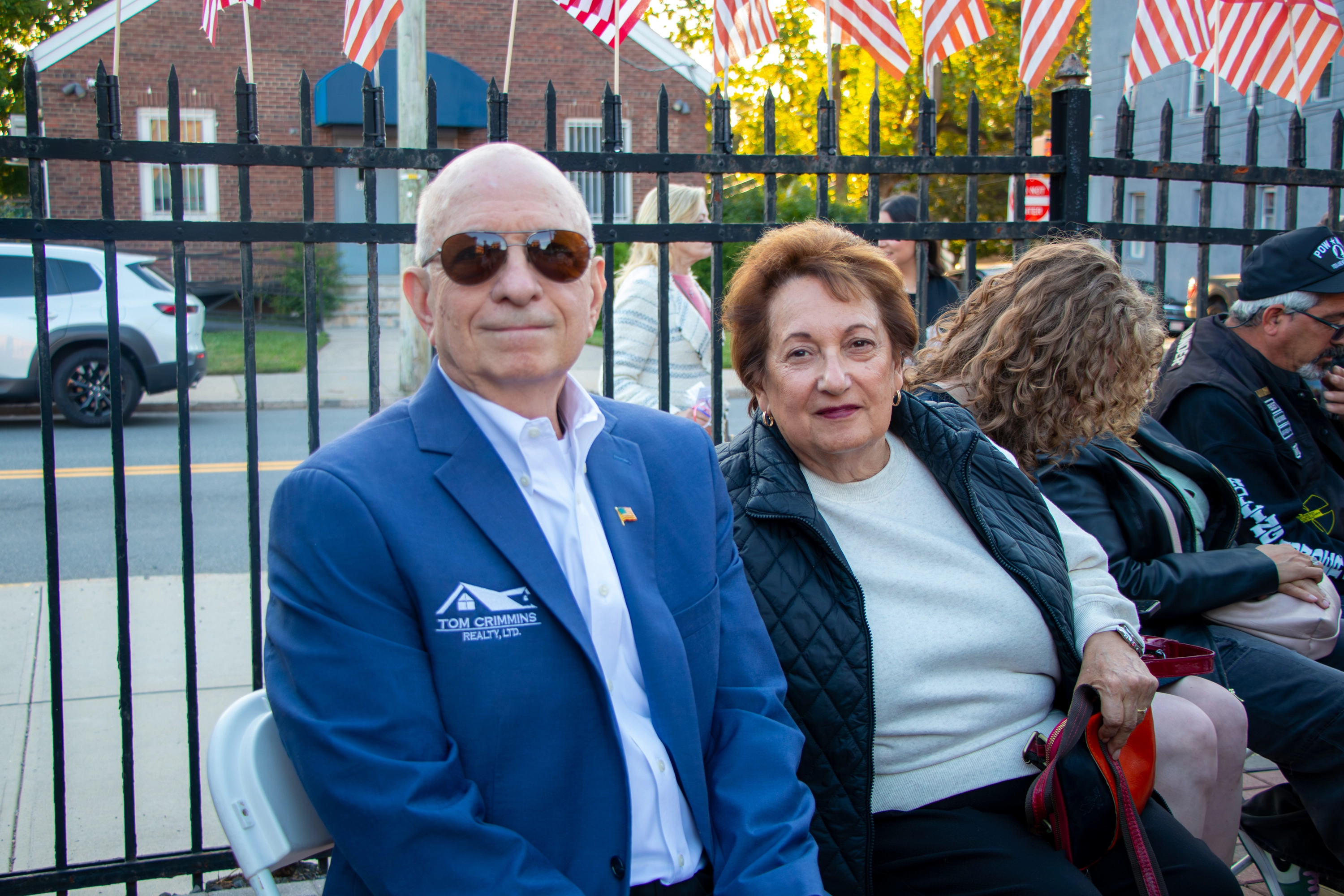 Veterans saluting at memorial